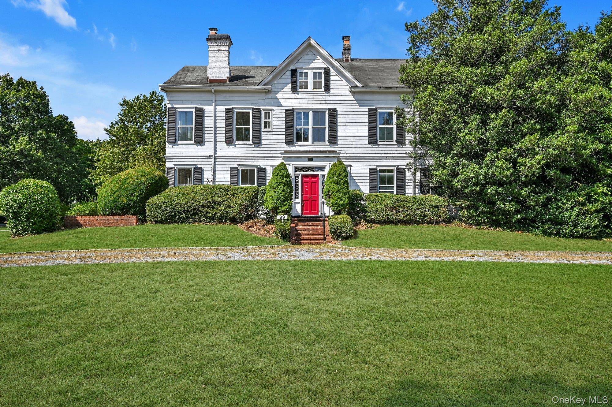 Welcome to 99 9th Street, Garden City, a truly special Historical Colonial set on over three quarters of an acre in the heart of the Village.