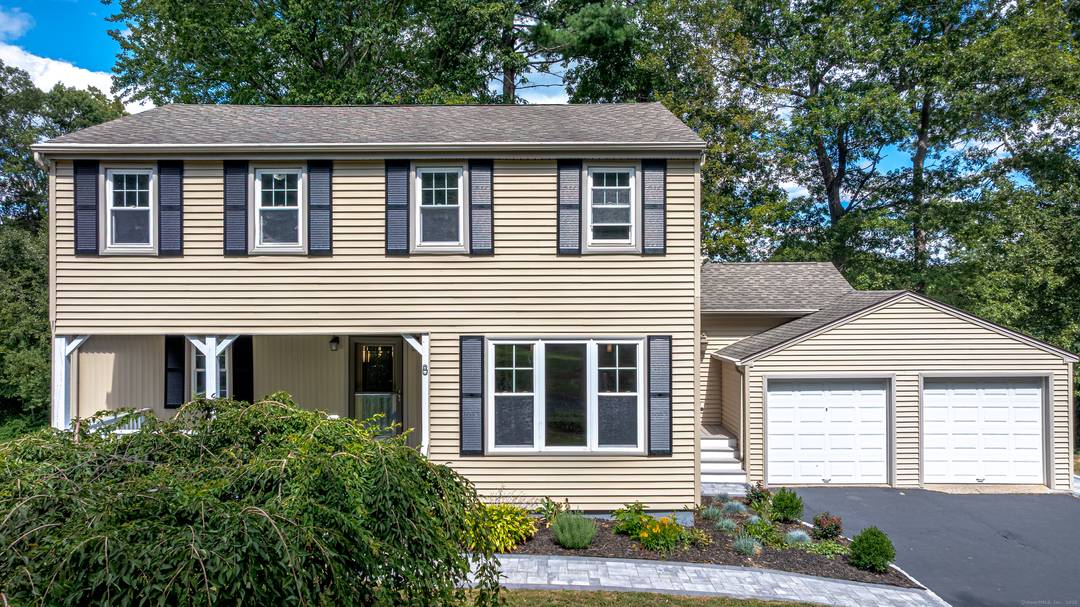 Welcome to this inviting 4 bedroom colonial on a cul de sac near the center of town of Wolcott.