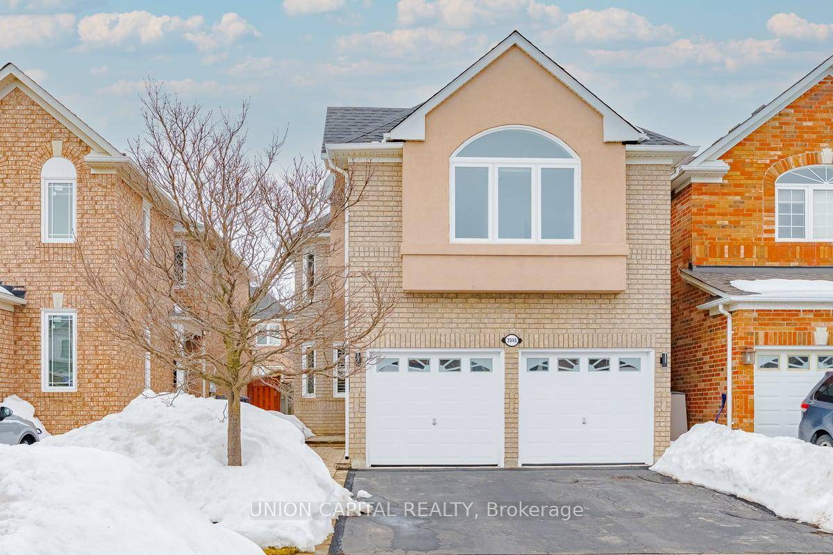 A must see stunning 4 bedroom, 4 bathroom detached home, nestled in the highly desirable Lisgar community !