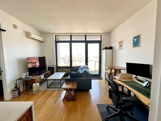 Welcome to this Rent Stabilized sunny, airy one bedroom apartment in the heart of Williamsburg, featuring high ceilings, a spacious bedroom closet, and a large private balcony with sweeping, unobstructed ...