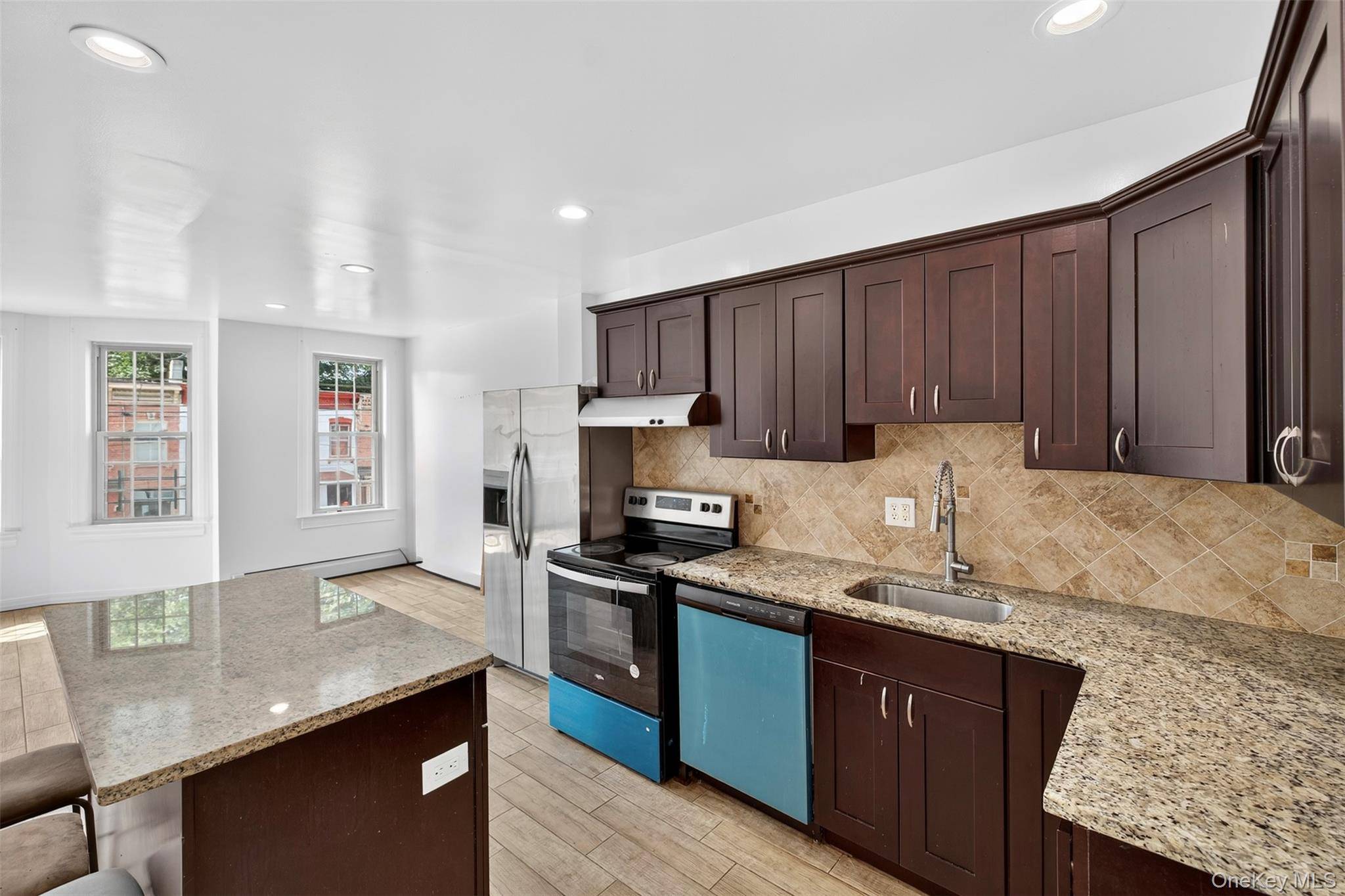 Beautifully updated 2 family brick building located in the East End Historic District of the City of Newburgh.