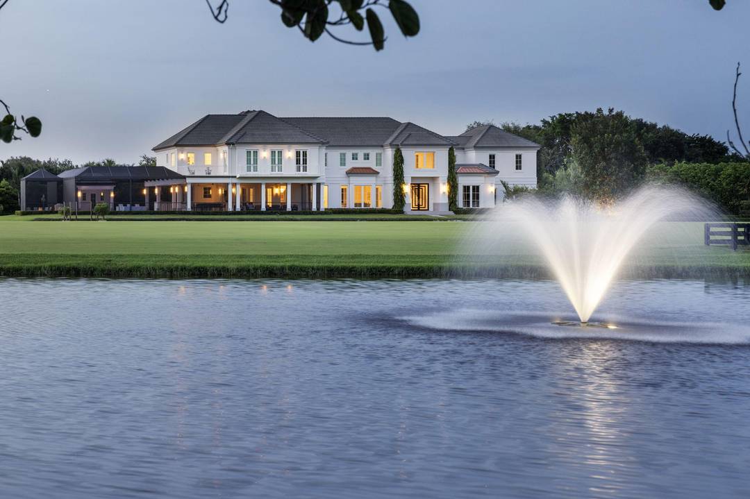 Nestled within the prestigious gated enclave of Palm Beach Point, just one mile from the world renowned Wellington Equestrian Festival, this impeccable 23 acre estate represents the pinnacle of luxury ...