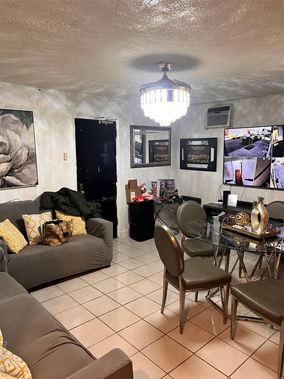 5 Units in property, 4 Residential apartments 1 commercial.