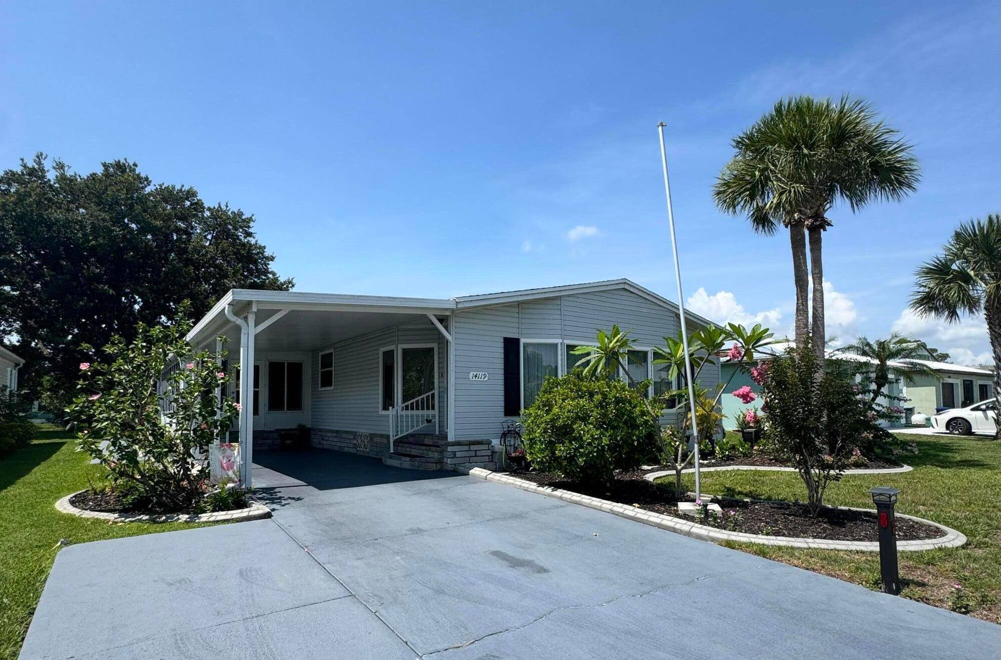 Lovely and Immaculate 2 bedroom 2 bath home in the desirable Spanish Lakes 55 community.