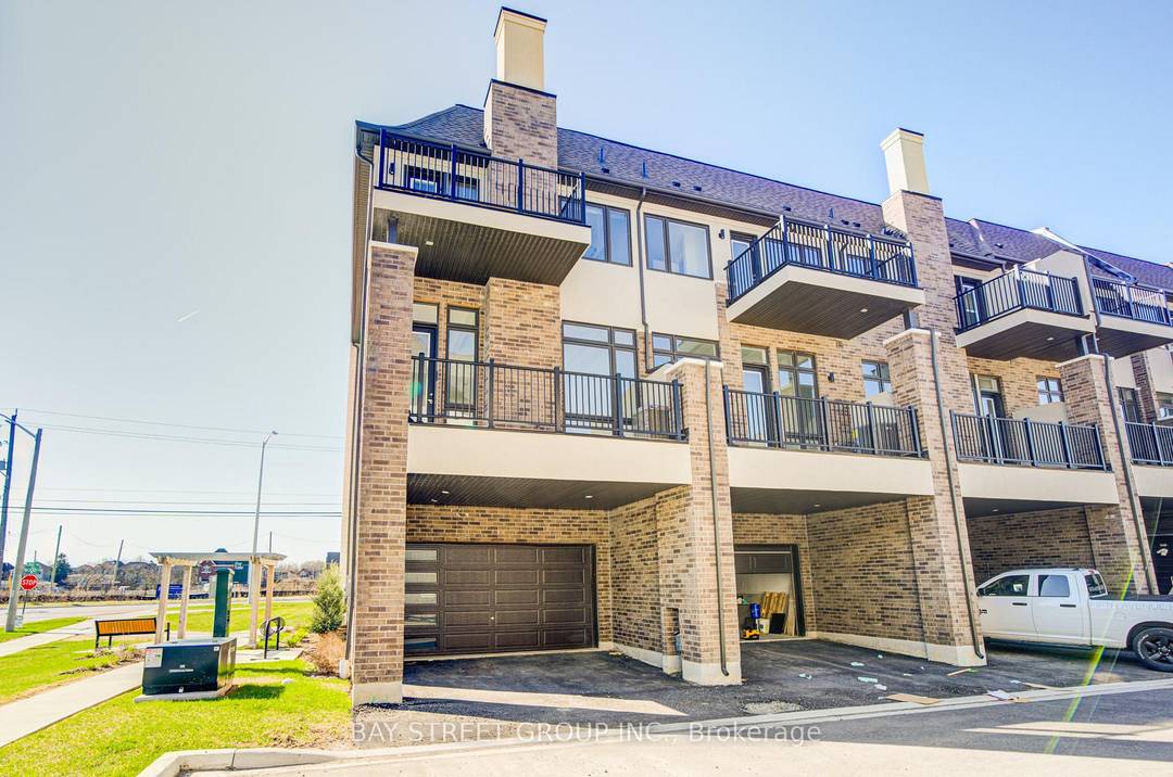 Stunning CORNER 3 storey townhome with luxury finishes throughout !