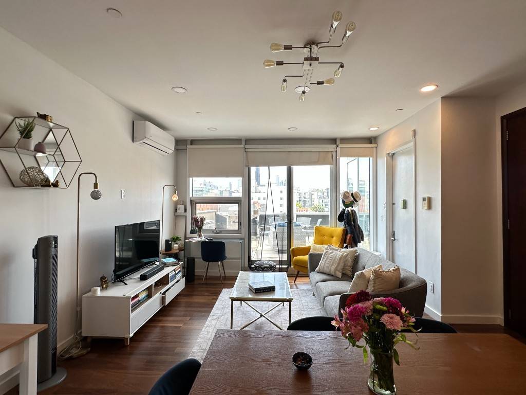 No Fee Newly renovated penthouse 2bed, 2bath with a private 1118 square foot deck panoramic views overlooking the city skyline.