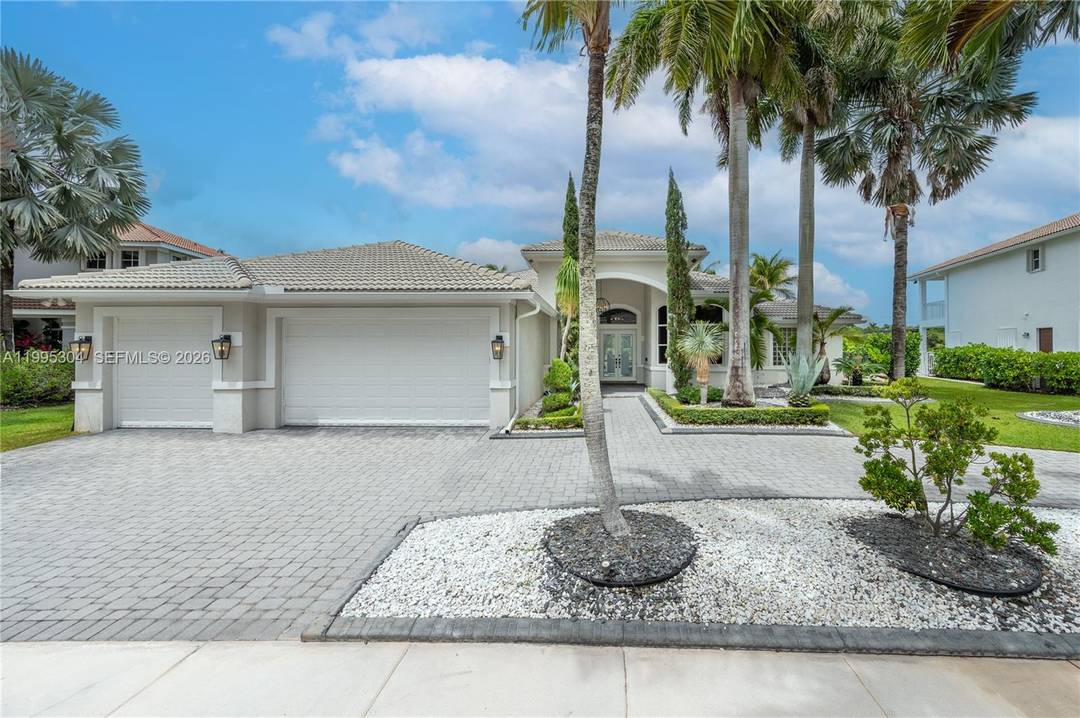 Beautiful one story home located in the desirable north section of Victoria Isle within Weston Hills, known for its oversized lots and enhanced privacy.
