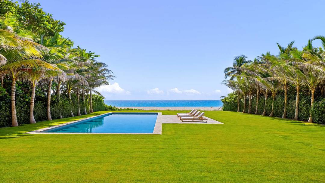 A rare opportunity to own a fully renovated direct oceanfront estate in Palm Beach.