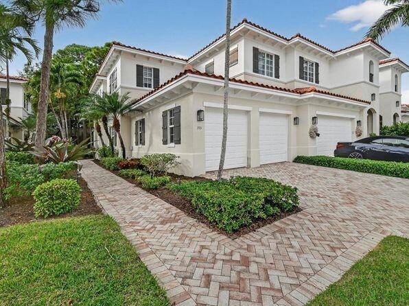 This modern, turn key, beautifully furnished open concept home at Frenchman's Reserve Country Club in Palm Beach Gardens offers a luxurious, low maintenance lifestyle.