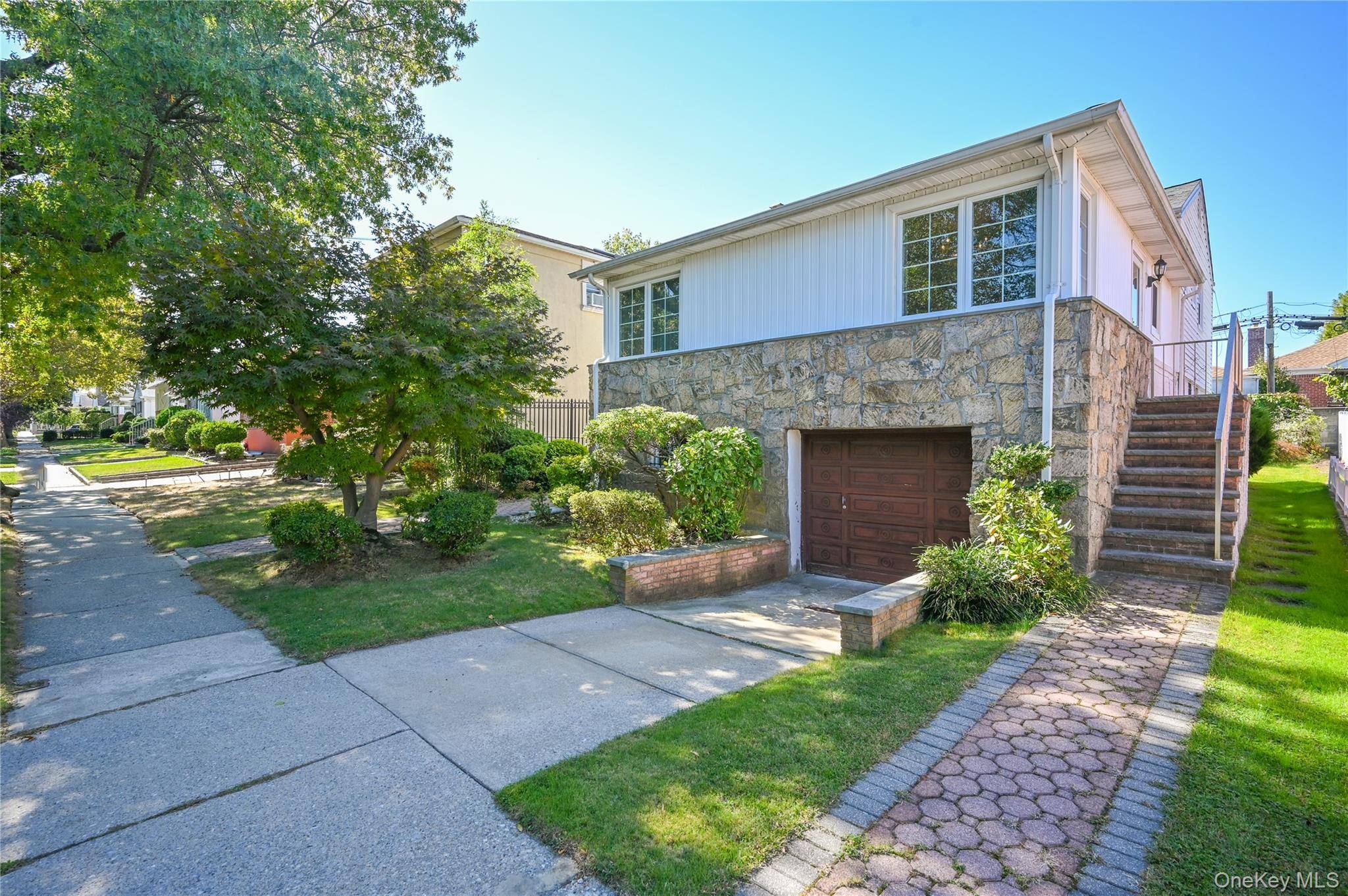 This beautiful single family split level home is located in heart of Bay Terrace.