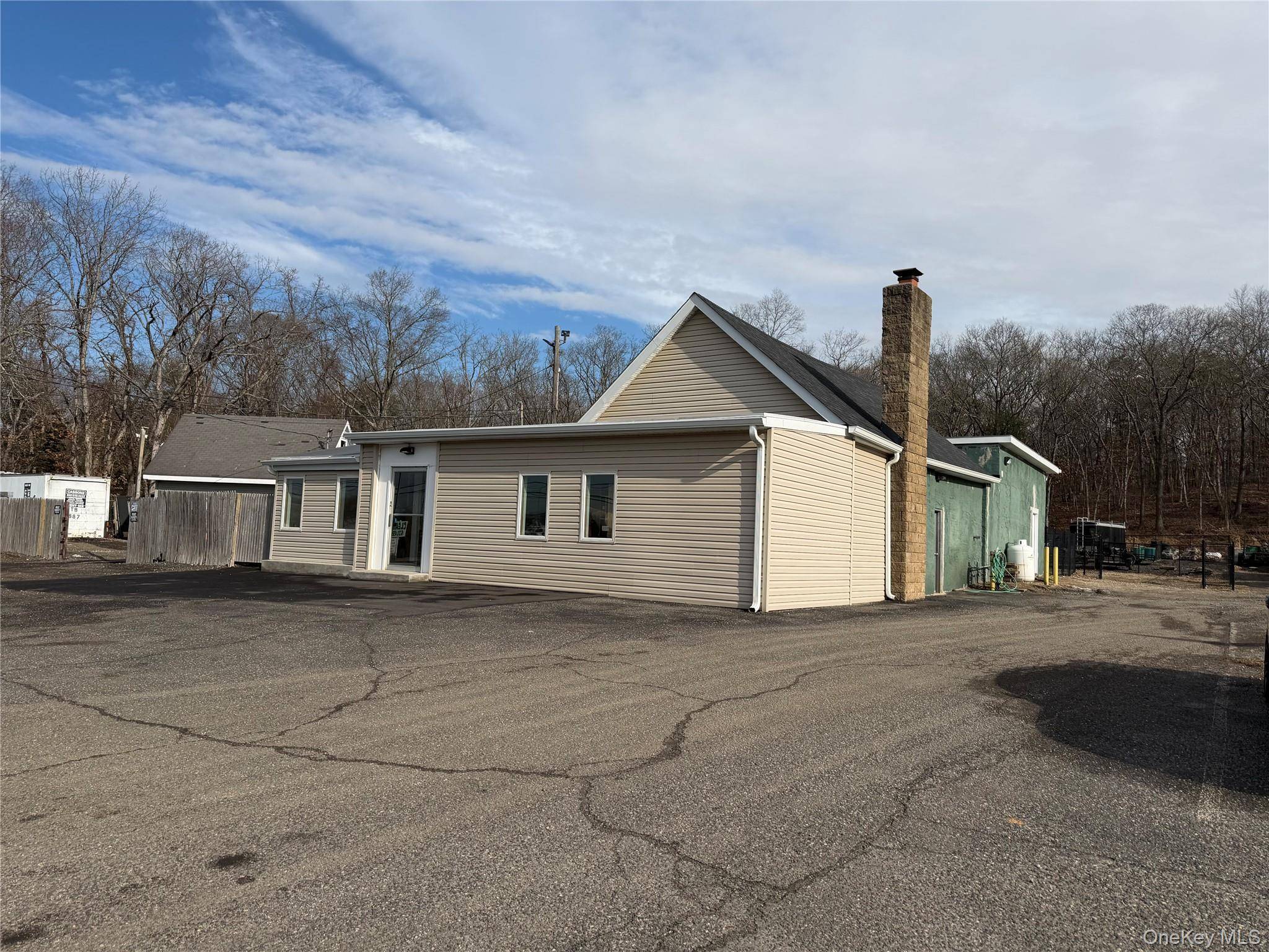 Freestanding office or retail building with work shop.