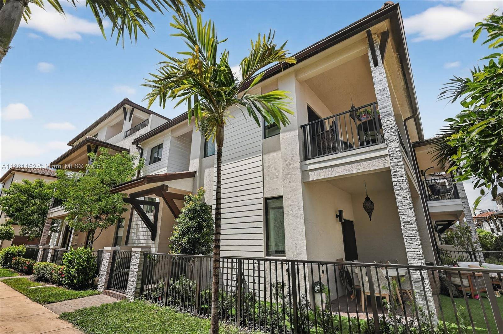 Incredible 2 story corner townhouse in the desirable Urbana community at Downtown Doral.
