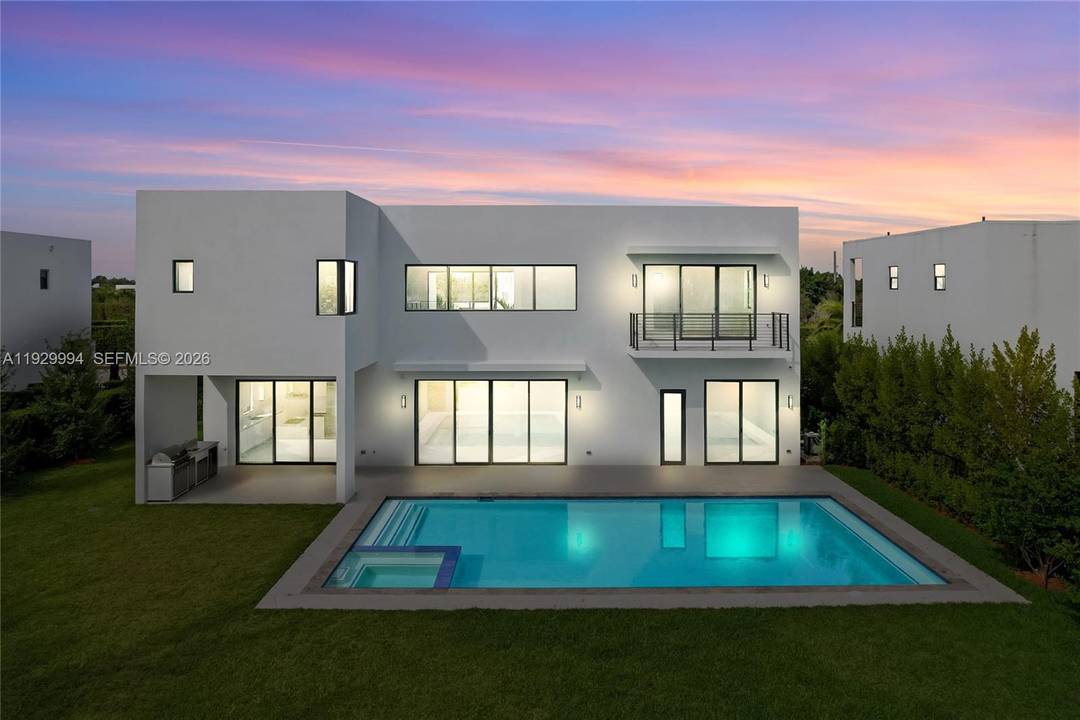 Stunning brand new two story lagoon front house located in the exclusive community of Botaniko.