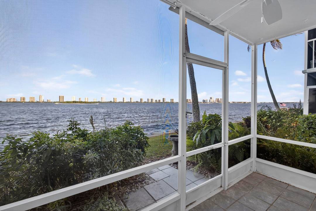 Rarely available 2 BR 1st floor unit on the direct Intracoastal with wide water views of the Intracoastal Waterway and Singer Island.