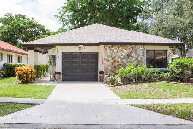 PREMIER LAKE FRONT 3 bedrooms, 2 baths, 1 car garage single family with 2 year NEW ROOF.