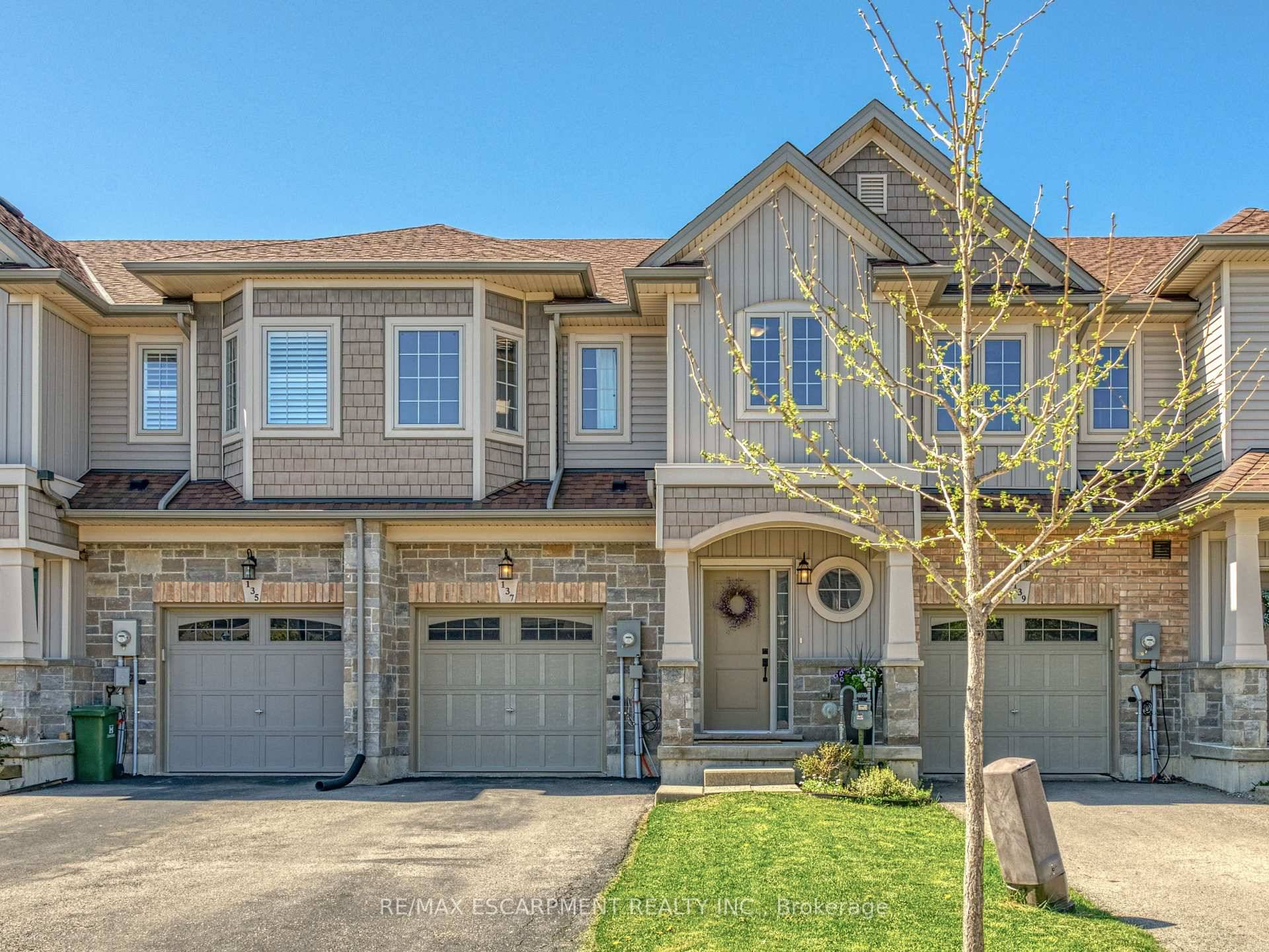 Beautiful freehold townhome backing onto peaceful and private greenspace.