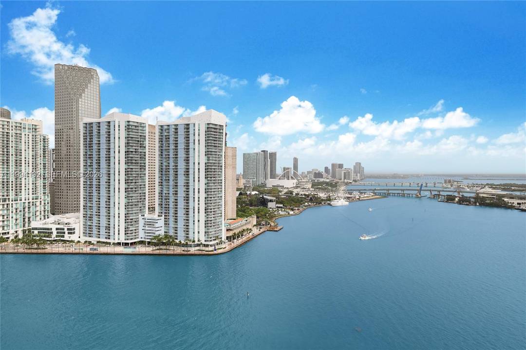 Perched on the exclusive enclave of Brickell Key, this stunning residence offers sweeping, unobstructed views stretching from Key Biscayne to Miami Beach, encompassing the Port of Miami and the glittering ...
