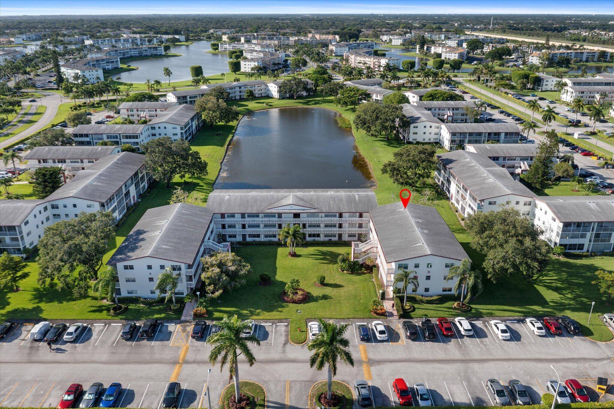 GORGEOUS ! Fully Remodeled Condo Corner Unit Tranquil Lake Views Highly Desirable 55 Century Village Bright Open Floor Plan Upgraded Flooring Custom Lighting Gorgeous Kitchen With Granite Counters, Tiled Backsplash, ...