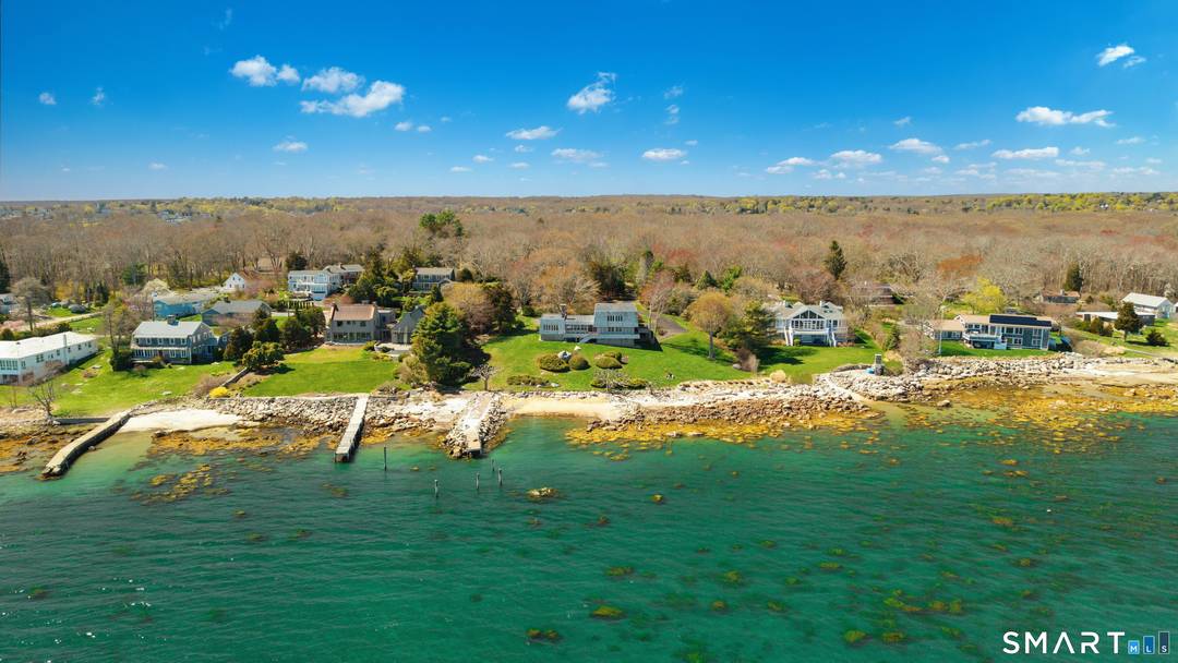 First time available in over 50 years, this generational waterfront estate on Masons Island presents an extraordinary coastal offering.