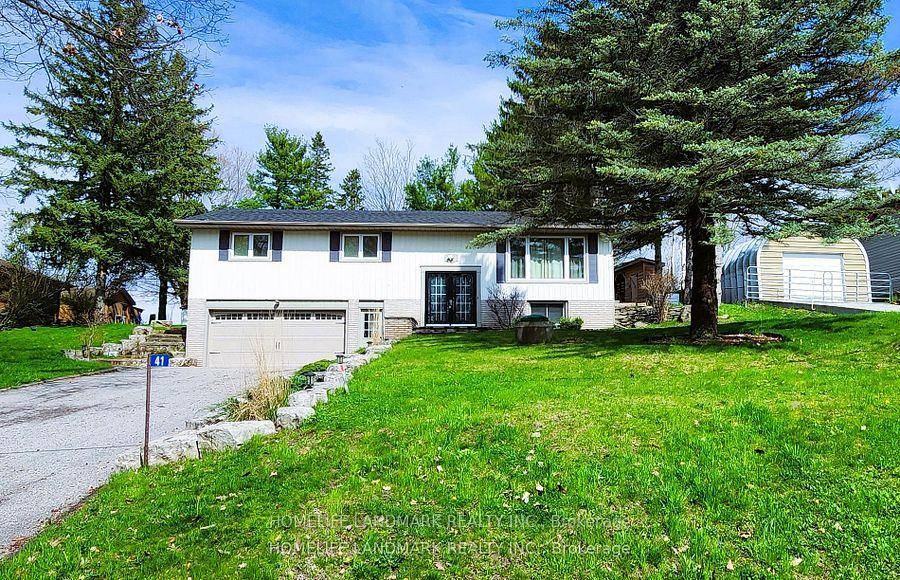 The Beautiful 3 bedroom raised bungalo nests on A Waterfront Community Scugog Island.