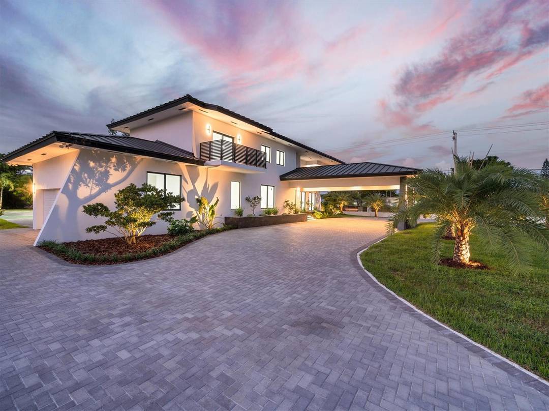 Nestled in the prestigious Miller Estates, this 7, 000 sq ft residence sits on over an acre in one of the most sought after neighborhoods.