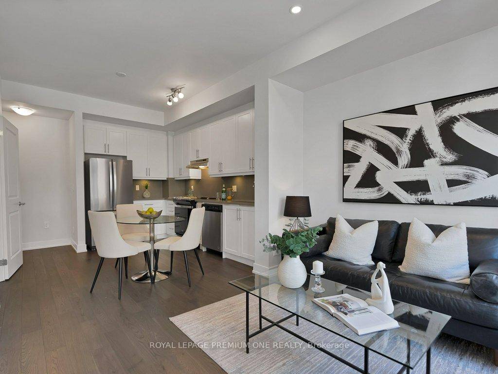 Experience refined living in this beautifully appointed stacked townhome, nestled in the sought after Sonoma Village community of Woodbridge.