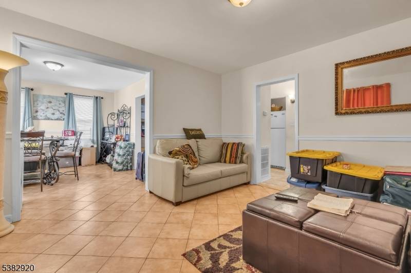 Charming and versatile 2 family home located on a quiet residential block in the heart of Hillside.