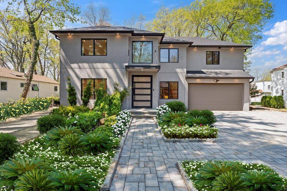 Welcome to this striking 5 bedroom, 4.