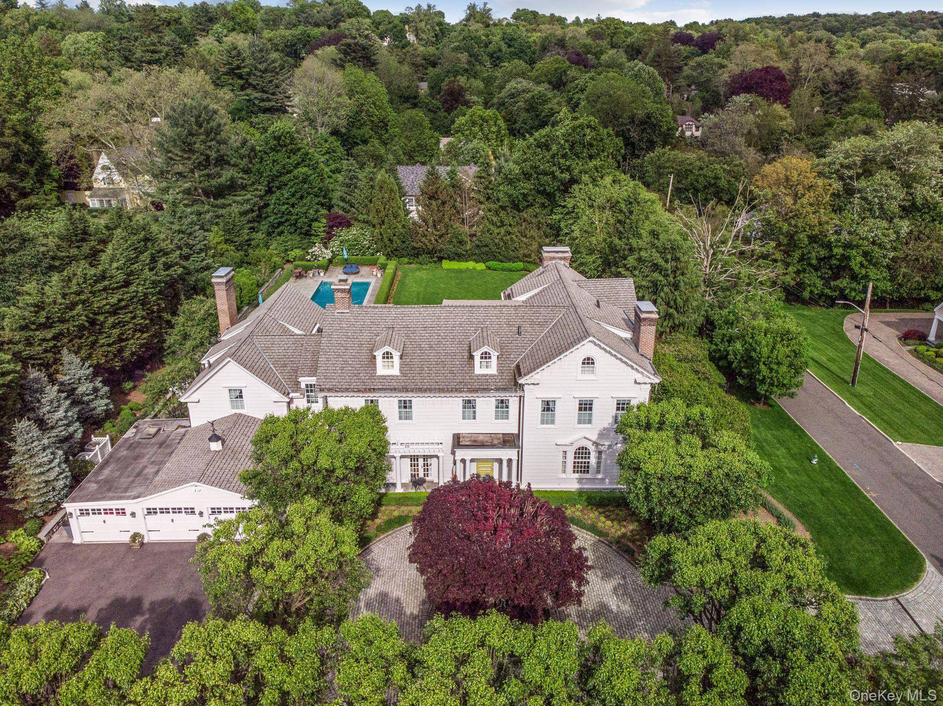Step into timeless elegance in Ardsley Park at this exquisitely renovated 1900 Colonial, where classic architectural details meet artisan craftsmanship and thoughtful modern upgrades.