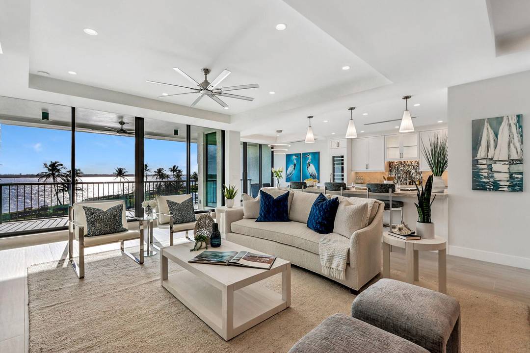 Located in the exclusive enclave of Sailfish Point, this two bedroom plus den, two and a half bath residence offers panoramic views of the St.