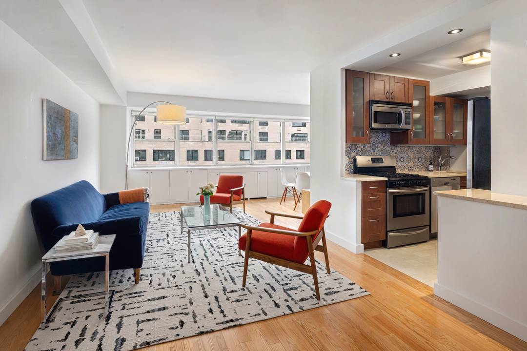 WELCOME to this OVER SIZED, MINT, MOVE IN READY, JUNIOR FOUR at 201 E 66th St !