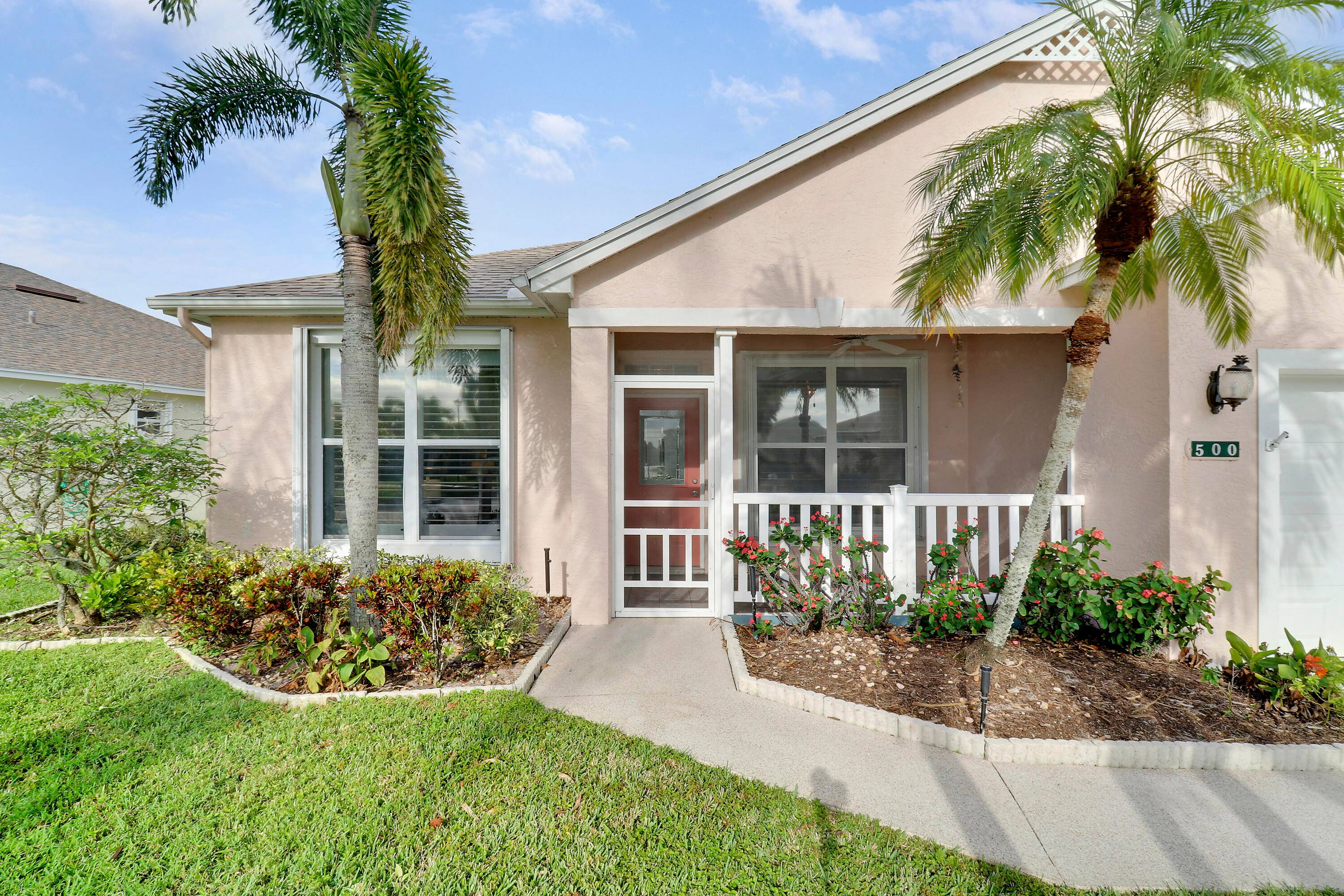PICTURESQUE Lake view from this 2BR 2BA 1CG Home in ST.