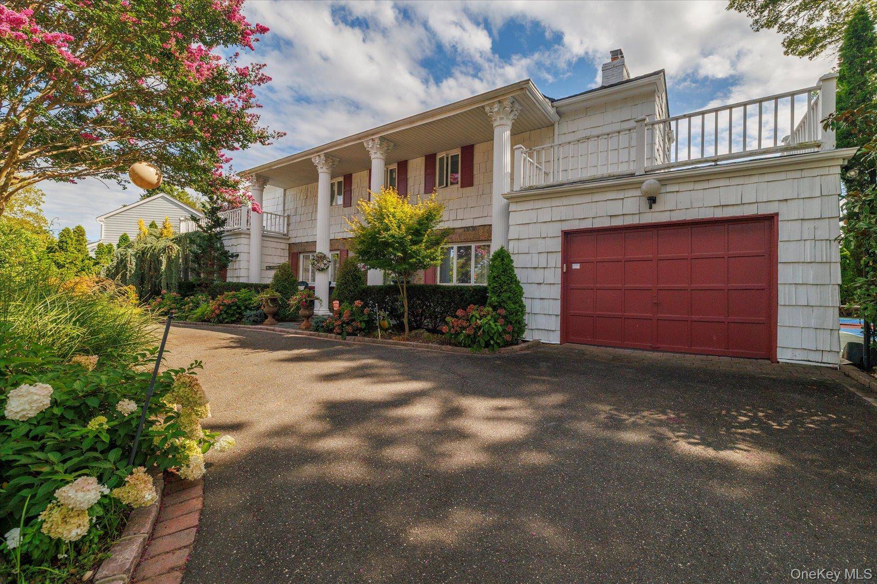 Discover the perfect blend of comfort, style, and convenience in this expansive 4 to 5 bedroom, 4 bath home set in the heart of Hewlett with an attached garage, an ...