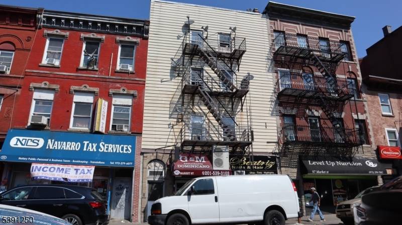 Bankruptcy Sale. Mixed use property with 2 retail units on the ground, 6 apartments above and 1 studio apartment in the rear with a private entrance and fenced garden patio ...