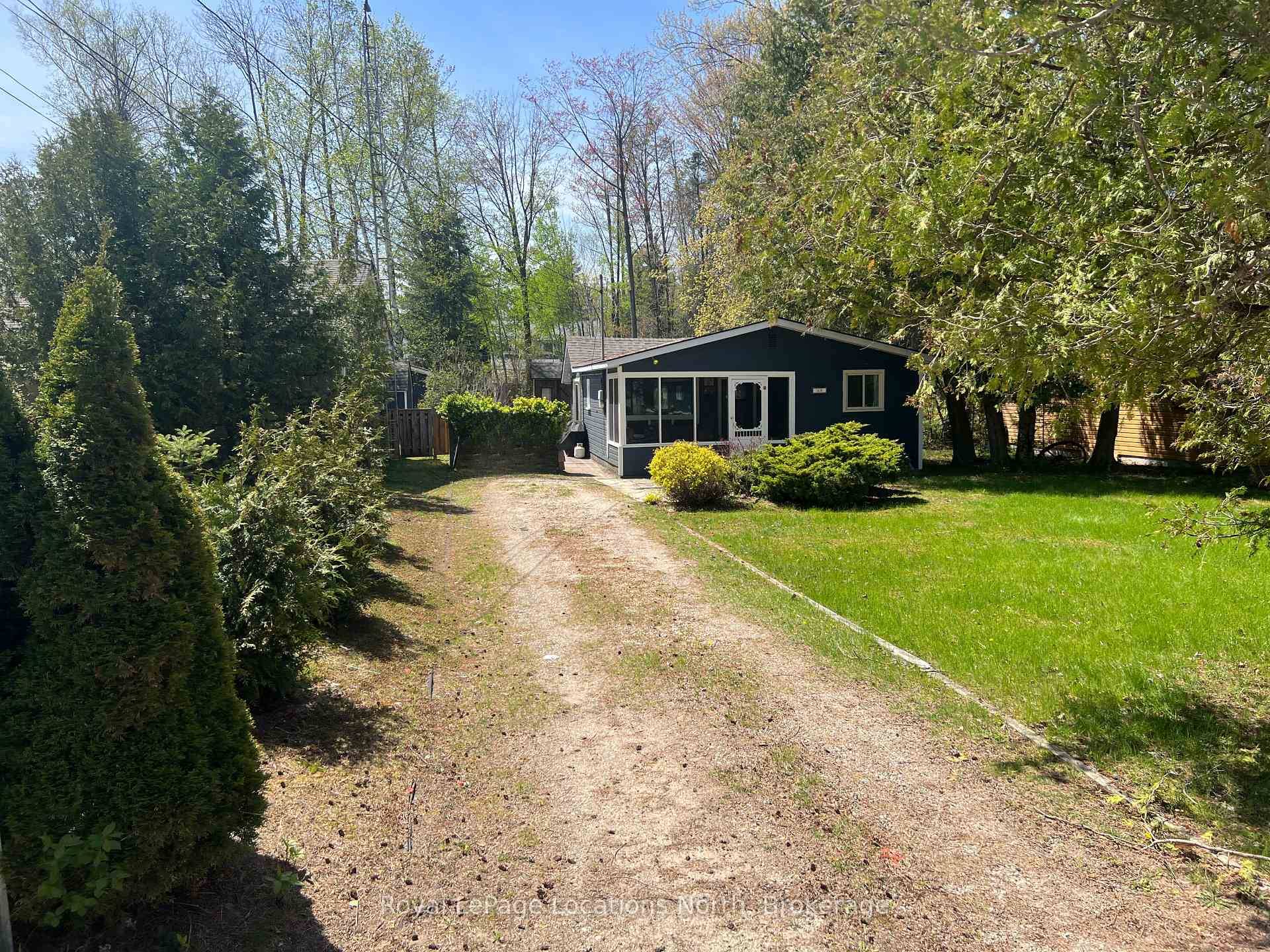 Escape to the ultimate year round Beach Lifestyle at 48 57th Street North in Wasaga Beach, where this charming 875 sq.