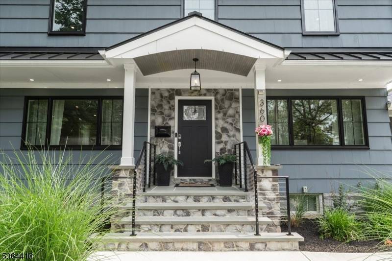 Welcome to this beautifully reimagined 1950s Center Hall Colonial that gracefully blends classic architecture with bright, modern updates.