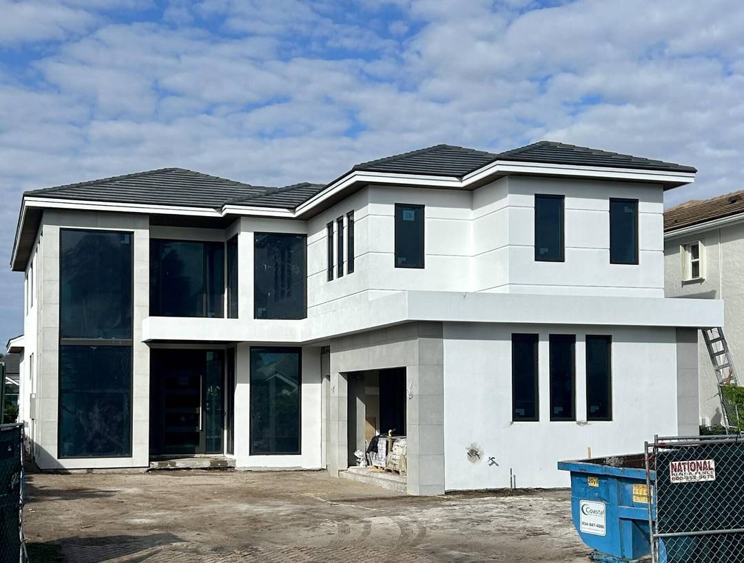 This newly constructed 3, 800 sq ft Modern Transitional lakefront residence embodies refined elegance and effortless livability.