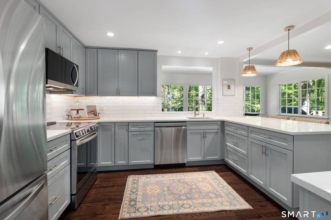 Quietly set back from the road in one of New Canaan's most serene settings, 493 Valley Road is a beautifully updated 4 bedroom, 4 bath Colonial offering an exceptional sense ...