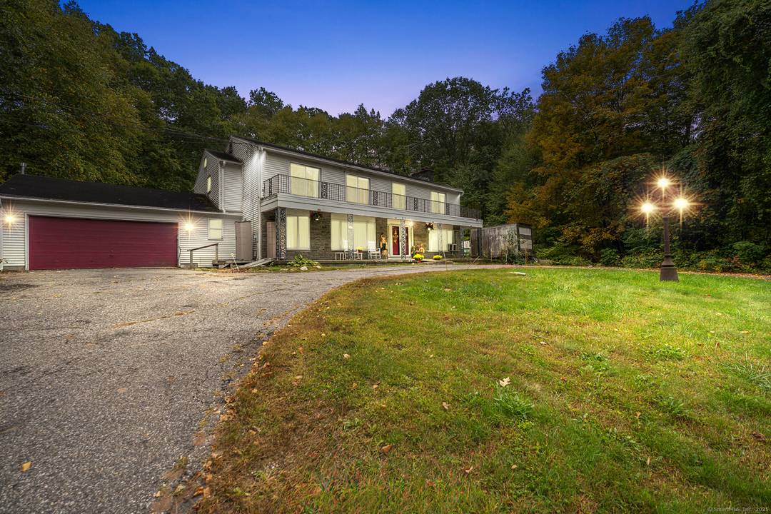 Welcome to this distinctive property showcasing wrought iron imported from Spain and a grand open foyer with double staircases.