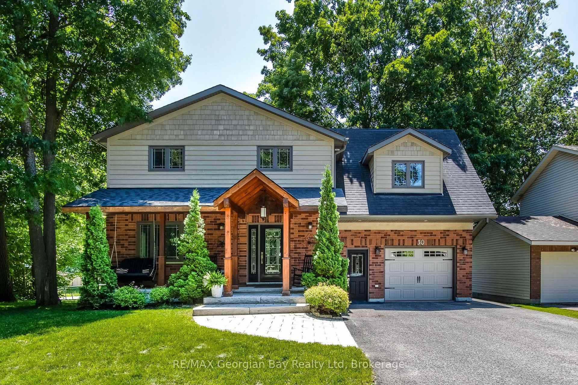 Welcome to this beautiful custom built home, perfectly situated on a quiet street and just a short walk to all amenities.
