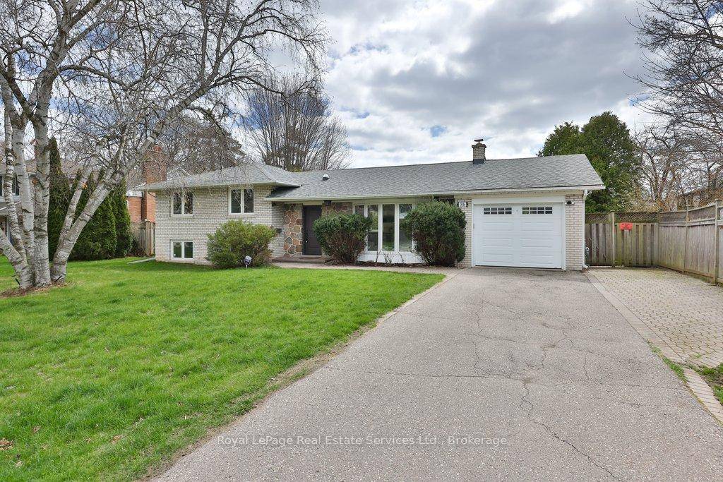 Spacious and bright 4 level sidesplit on a stunning 75 x 184' lot with a private south facing backyard in desirable Coronation Park.