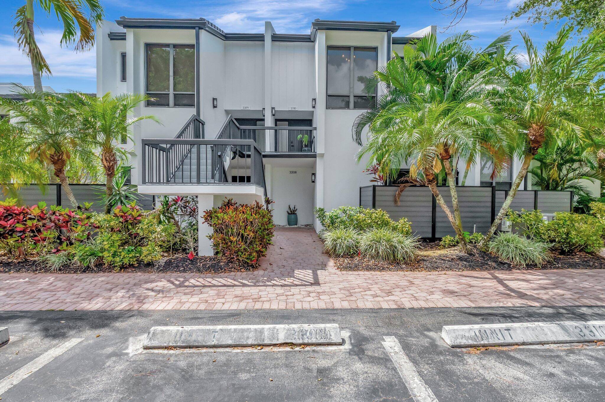 Captivating lakefront and golf views await in this spacious, beautifully updated home !