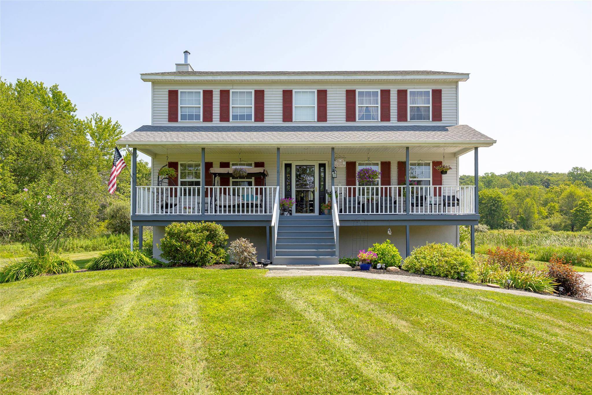 Tastefully updated and impeccably maintained colonial privately situated on beautiful 3.