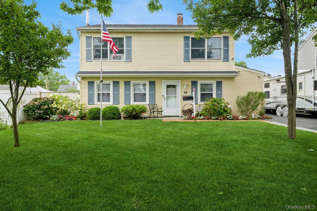 Welcome to 44 Rock Lane, nestled in the heart of historic Levittown !