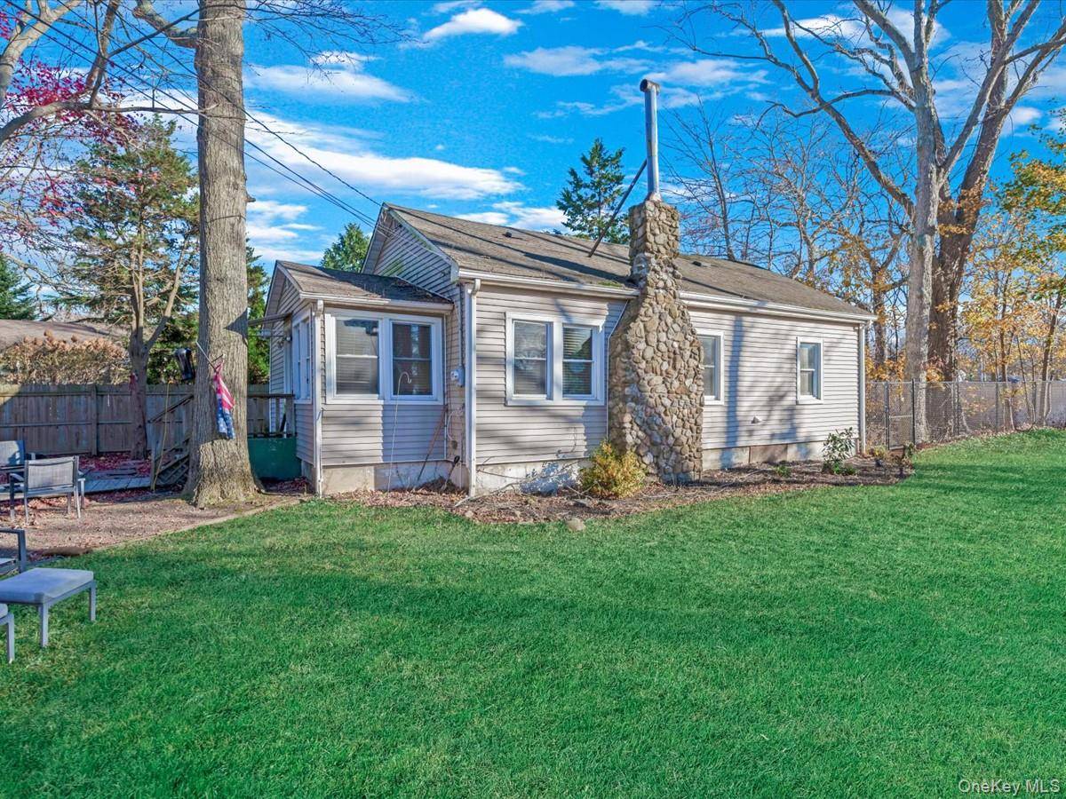 Presenting the most charming ranch set back on almost one third of an acre giving you 3 bedrooms and an open concept living space with high, coffered ceilings and a ...