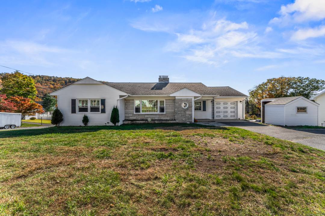 Welcome to your dream home at this beautifully updated 2000 sq ft Ranch, nestled on a generous 0.