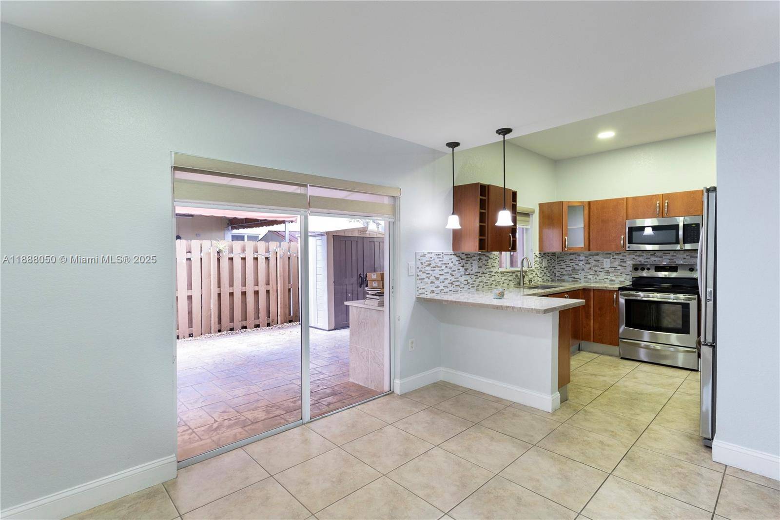 Huge, turnkey townhouse with patio and two parking spaces.