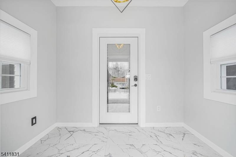 This completely renovated home offers approximately 2, 500 square feet of beautifully designed living space.