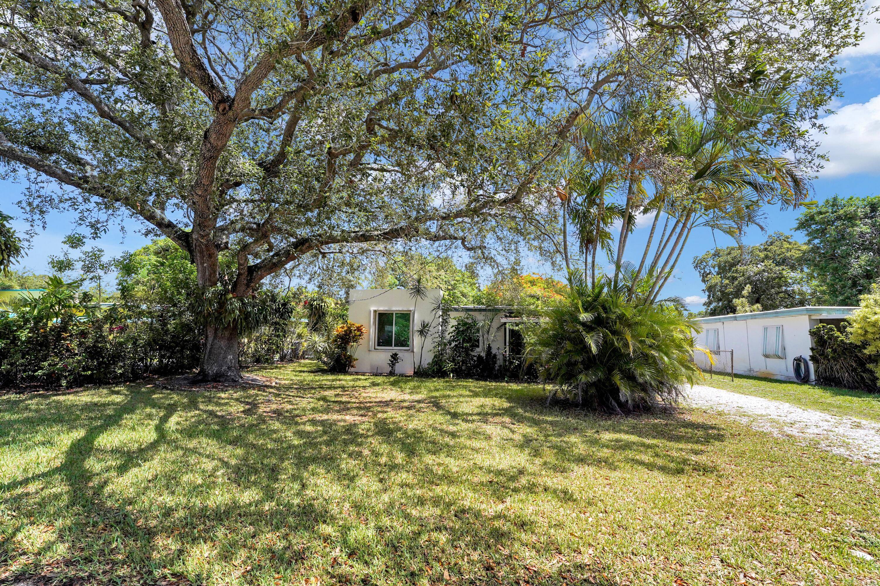 Discover this charming South Florida home on a spacious 10, 500 sqft lot located on a quiet cul de sac.