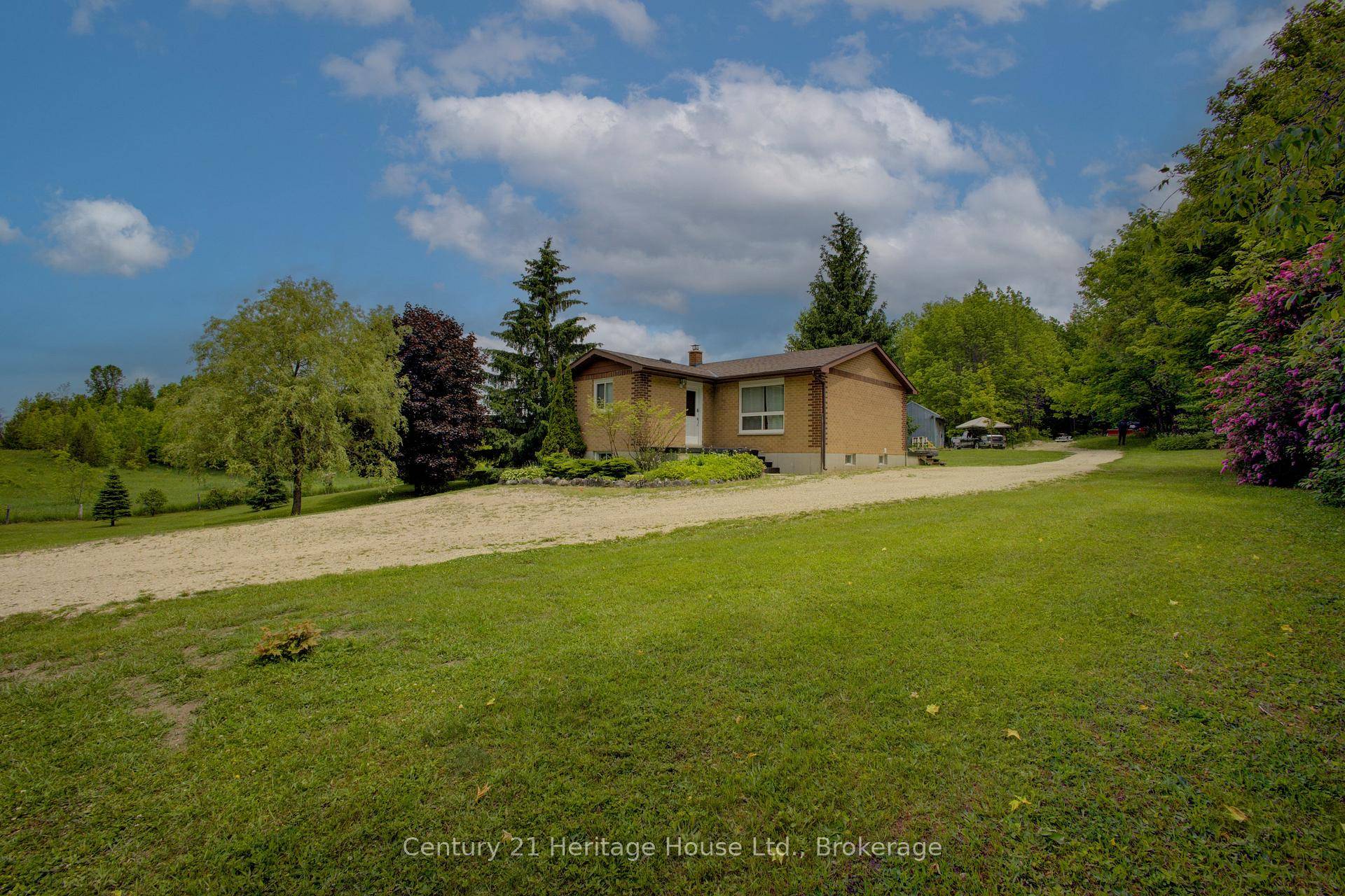 Discover the charm of rural life with this well situated property offering 3.